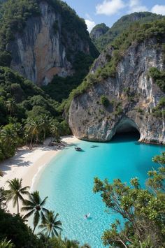 the beach is surrounded by mountains and blue water, with boats in the water near it