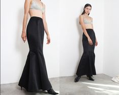 1990s black satin jet black tailored panels mermaid maxi skirt> floor length> centered back concealed zip closure> unlined [ worn pinned to fit model ] label> niiientie material> not listed [ synthetic ] size> 38 waist> 70cm hips> 96cm length> 106cm condition> excellent vintage condition | model is 174 cm [5'8"] and measures 80-56-90 cm [31"-22"-35"]  | Fitted Bias Cut Maxi Skirt For Night Out, Fitted Satin Maxi Skirt For Night Out, Fitted Bias Cut Bottoms For Night Out, Fitted Party Bottoms With Bias Cut, Fitted Full-length Bias Cut Maxi Skirt, Fitted Bias-cut Maxi Skirt, Fitted Full-length Maxi Skirt For Gala, Full Length Bias Cut Bottoms For Evening, Formal High-waist Fitted Maxi Skirt