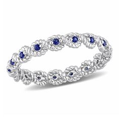 Look extraordinary with this Created Blue Sapphire Twisted Eternity Band.Crafted in lustrous white gold and features 17 round cut, prong set created blue sapphire gemstones (1.25 x 1.25mm) beautifully ribbed in a twisted design sliding down all over the band.Enhanced with a high polish finish, this intricate band is su Color Correcting Cream, White Gold Sapphire, Rings Jewelry Fashion, Pearl Flower, Eternity Band, Sapphire Gemstone, Flower Ring, Eternity Ring, Prong Setting