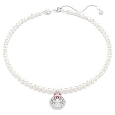 This Idyllia pendant will immerse your style in the beauty of the ocean. The jewelry is worn on a string of gray Swarovski Pearls, featuring a central shell motif that is made from clear Swarovski Zirconia and a luminous pink crystal. A captivating piece of marine-inspired radiance that will always look elegant. Exquisite White Jewelry With Pearl Charm, White Pearl Pendant Necklace, White Akoya Pearl Round Pendant Necklace, White Pearl Charm Necklace Fine Jewelry, Exquisite White Pearl Chain Necklace, Exquisite Akoya Pearl Pendant Necklace, White Akoya Pearl Necklace With Pearl Pendant, Luxury White Necklace With Pearl Pendant, Luxury White Necklaces With Pearl Charm