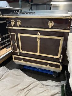 an old fashioned oven is being worked on