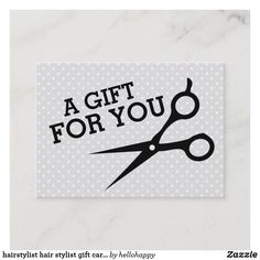 a gift for you sticker on a white marble surface with black scissors and polka dots