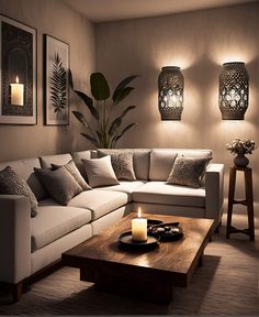 a living room filled with lots of furniture next to a wall mounted candle holder and potted plant