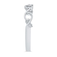 Achieve a most elegant look when you wear this enchanting diamond filigree ring in white gold, a beautiful choice for day or night. Fashioned in cool 10K white gold Diamonds dot scrolling ribbons in this filigree-style design. This ring captivates with 1/10 ct. t.w. of diamonds. Elegant White Filigree Ring With Diamond Cut, Elegant Infinity Diamond Promise Ring, Elegant White Filigree Ring With Brilliant Cut, White Infinity Diamond Promise Ring, Elegant Infinity Cubic Zirconia Diamond Ring, White Brilliant Cut Infinity Diamond Ring, Elegant White Diamond Infinity Ring, Elegant White Diamond Ring With Diamond Cut, White Diamond Ring With Intricate Design