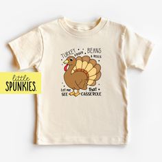 Vintage Turkey Shirt, Turkey Gravy Beans Rolls Let Me See That Casserole Kids Shirt, Fall Foods, Toddler Natural Tee PRODUCTION TIME Little Spunkies from the designer/owner of Spunky Pineapple Co https://www.etsy.com/shop/SpunkyPineappleCo   All baby and toddler clothes are 100% designed and printed with water based ink. All orders placed before 12:00 pm EST are shipped out same day (Monday - Friday). Orders received after noon are shipped out the next business day. ONESIES® BRAND Made from 100% Cotton. We print on Onesies® Brand. T-SHIRT Made from 100% Cotton. These run true to size. If you are in between sizes we suggest sizing up. ADULT T-SHIRT Made from 100% Cotton. WOMEN For a relax fitting tee order the size you normally wear. If you would like a more fitted look then order a size do Little Turkey Thanksgiving Shirt, Baby Turkey Shirt, Little Turkey Shirt, Its All Gravy Baby Shirt, Turkey Rolls, Funny Fall, Fall Foods, Turkey Shirts, Turkey Gravy