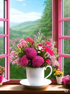 a vase filled with pink flowers sitting on top of a table next to a window