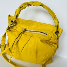 Questions? Leave A Comment Below! Coach Leather Bag Pre Owned 100% Leather Beautiful Color Yellow Button Snap As Closure Inside Zipper Interior Clean Exterior 2 Slight Marks Please Review Picture # 10 And Picture # 11 Shoulder Strap Adjustable Detachable Long Strap As Well This Bag Has Dual Straps Coach Leather Bag, Interior Clean, Coach Leather, Leather Purse, Yellow Color, Leather Purses, Coach Bags, Leather Bag, Beautiful Colors