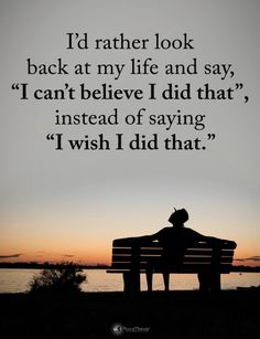 a man sitting on top of a bench next to the ocean at sunset with a poem written in front of him