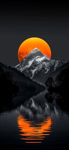 the full moon is setting over a mountain range with water and trees in front of it