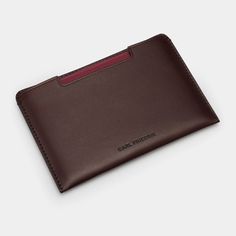 Leather Passport Cover Easton · CarlFriedrik Modern Brown Card Holder For Travel, Modern Trifold Wallet With Card Slots For Travel, Modern Trifold Wallet With Interior Card Slots For Travel, Classic Travel Accessories With Interior Card Slots For Business, Bifold Wallet With Hidden Phone Sleeve For Travel, Travel Bifold Wallet With Hidden Phone Sleeve, Classic Travel Wallets With Card Slots, Classic Travel Accessories With Rfid Blocking For Everyday, Trifold Travel Card Holder With Interior Slots