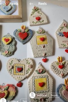 several ornaments are arranged on a table with the words love spelled in small letters and hearts