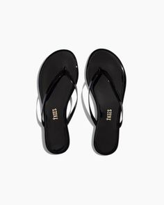 Lily Glosses in Licorice | Flip-Flops | Women's Footwear – TKEES Classic Summer Flip Flops With Cushioned Footbed, Classic Cushioned Flip Flops For Summer, Sleek Synthetic Flip Flops For Summer, Sleek Synthetic Summer Flip Flops, Classic Summer Flip Flops, Summer Glossy Patent Leather Sandals, Sleek Patent Leather Sandals With Glossy Finish, Sleek Glossy Patent Leather Sandals, Glossy Patent Leather Sandals With Round Toe