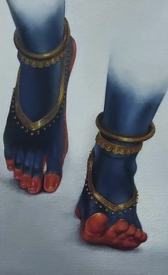 a painting of two feet wearing blue and red shoes with gold chains around their ankles