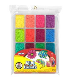 mini beads in a plastic bag with flowers and fish on the inside, assorted colors