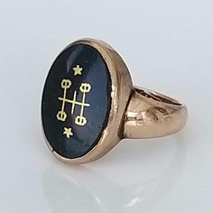 Fabulous  bloodstone signet ring in  solid gold. The oval bloodstone measures 15mm x 11mm with unusual gold engraving to the stone... I understand that the inscription was a personal statement based on ancient Astrological symbols embodying the belief in acceptance and inclusion of all- a sentiment so important today! The solid band measures 6mm wide at the shoulder tapering to 3mm wide at the back off the band... Fabulous  signet ring! ▪ Overall Condition: Excellent ▪ Metal:  Gold ▪ Gem: Bloods Spiritual Hallmarked Signet Ring For Formal Occasions, Hallmarked Oval Cabochon Signet Ring For Gift, Spiritual Oval Signet Ring Collectible, Oval Engraved Enamel Ring For Formal Occasions, Oval Engraved Enamel Ring As Gift, Surprise For Wife, K Ring, Engagement Present, Anniversary Surprise