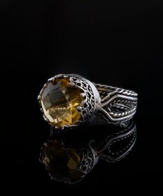 Looking for a perfect gift for your loved ones? Look no further than this stunning silver filigree art women's cocktail dainty ring. With its intricate details and eye-catching design, this ring is sure to make a lasting impression. Featuring a double-sided faceted checkerboard round-cut citrine gemstone that measures 10mm and has a 0.47" / 12.00 mm width face size, this ring looks absolutely gorgeous when worn. This gorgeous piece comes complete with a velvet pouch, silver polish cloth, and a l Silver Cocktail, Silver Polish, Art Women, Sterling Silver Filigree, Citrine Gemstone, Velvet Pouch, All Eyes, Silver Filigree, Dainty Ring