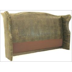 a bed headboard made out of fabric and leather with a brown stripe down the middle