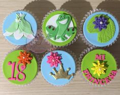 six cupcakes decorated with different designs and numbers