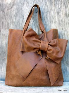 Luxe leather, tied up in a bow. Bag Jeans, Bow Bag, Handbag Heaven, Leather Bow, Cute Purses, Leather Bows, Cute Bags, Rocky Mountain