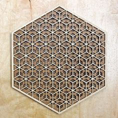 an intricate wooden design on a wall