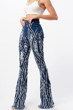 High-rise, bell bottom jeans with extreme distressing and fraying design. Traditional 5-pocket construction with a zip fly and button closure. Slim fit silhouette with a comfortable stretch. This style is truly one of a kind. However as with any distressed jeans, some minor flaws may be present such as torn fringe tassels or cuts and uneven colors. Each item is inspected for quality. CARE | Hand Wash or Machine Wash Gentle in a Wash Bag CONTENTS | 97% Cotton, 3% Spandex MEASUREMENTS | 45"/114 cm Sparkle Jeans, Bag Contents, Purple Candy, High Rise Denim Jeans, Fashion Book, Bottom Jeans, High Waisted Flares, Flare Leg Jeans, Bell Bottom Pants