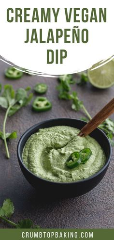 creamy vegan jalapeno dip in a black bowl