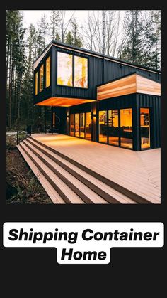 two story shipping container home in the woods