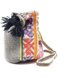 These charming bags are made of repurposed vintage hand woven textiles from the villages of the Sacred Valley in Cusco, Peru. Each features a drawstring to keep your treasures secure and a shoulder strap for carrying close. They are lined with soft black material. Great for holding special medicine pieces or use it as a change purse. Each one is unique & beautiful; let us pick one for you! Bohemian Multicolor Bucket Bag For Travel, Weaved Bucket Bag For Market, Vintage Handwoven Bags For Market, Vintage Handwoven Bag, Weaving Bucket Bag For Travel, Handwoven Pouch Bucket Bag For Travel, Woven Hobo Shoulder Bag For Travel, Bohemian Bucket Bag For Market, Bohemian Multicolor Bucket Bag Gift