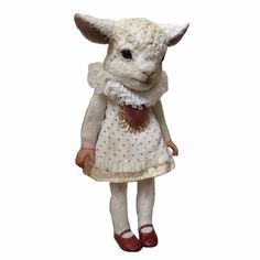 a stuffed animal wearing a white dress and red shoes is standing in front of a white background