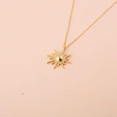 Our 14K Solid Gold Sunburst Necklace is a luxurious and elegant piece, perfect for adding a touch of radiance to your style. The necklace features a meticulously handcrafted sunburst pendant, sized 17mm by 17mm, symbolizing warmth, energy, and vitality. Whether you choose the classic elegance of Gold, the soft allure of Rose Gold, or the pristine sophistication of White Gold, this necklace is a versatile addition to any jewelry collection. Crafted from high-quality 14K solid gold, it is not only Elegant Yellow Gold Sun Design Necklace, Luxury Gold Starburst Jewelry, Elegant Sun Design Necklace, Elegant Sun Design Starburst Jewelry, Elegant Starburst Sun Design Jewelry, Luxury Starburst Gold Jewelry, Elegant Sun Design Pendant Necklace, Elegant Sunburst Jewelry With Sun Design, Elegant Gold Sunburst Jewelry