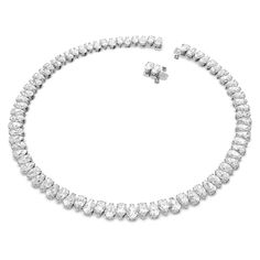 The glitter of Swarovski's crystal craftsmanship comes to life in the elegant Millenia necklace. Delicate pear-cut crystals pair together perfectly to create an elegant choker necklace. - Necklace measures approximately 14.50in -Swarovski's enduring quest for innovation, beauty and excellence is characteristic of their exquisite designs Explore Swarovski and shop other stunning designs Enjoy complimentary cleaning and inspection at any Day's location for the life of this Swarovski jewelry piece Swarovski Choker, Swarovski Millenia, Elegant Choker, Expensive Jewelry Luxury, Diamond Jewelry Necklace, Diamond Choker, Jewellery Uk, Expensive Jewelry, Swarovski Jewelry