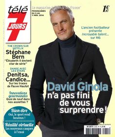 a magazine cover with a man in a black suit on the front and back covers