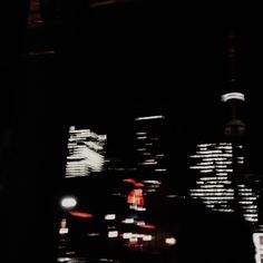 blurry photograph of city lights at night