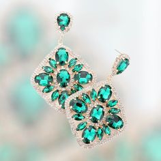 These stylish emerald dangle earrings are the perfect accessory for many formal events. Pageants, Prom, Bridal, Wedding Day, Holiday Gift, sweet 16, On stage earrings, Gifts for her . Earring Color: emerald, gold  Earring Length: 3'' inches  Earring Length: 1.9'' Inches Earring Type: Pierced/ Post Back Other Colors available in my shop.  If you can't find what you are looking for please contact me I'd love to help. Need multiple pairs for bridal gifts or needing a different color? I would love t Prom Rings, Green Statement Earrings, Pageant Jewelry, Green Dangle Earrings, Pageant Earrings, Green Prom, Prom Earrings, Prom Jewelry, Earrings Large