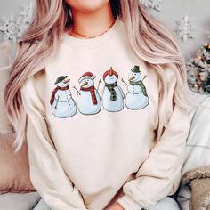 Celebrate the Season in Style with our Christmas Print Sweatshirt! Perfect for cozy holiday gatherings or a heartwarming gift, it’s the festive flair you need. Limited Edition – Grab yours before it’s gone! Cozy Christmas Tops With Relaxed Fit, Cozy Relaxed Fit Christmas Tops, Winter Holiday Relaxed Fit Tops, Winter Holiday Tops With Relaxed Fit, Relaxed Fit Winter Holiday Tops, Cute Winter Holiday Sweatshirt, Cute Sweatshirt For Holiday Winter, Winter Crew Neck Tops As Gifts, Cozy Crew Neck Top For Christmas