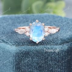 ---------------------->Unique moonstone engagement ring&wedding ring<----------------------------- https://www.etsy.com/shop/Dreamcraftjewelry?ref=seller-platform-mcnav&section_id=30490640 --->Ring details: - Theme:Romantic Wedding & Engagement - comfortable band - Center Stone : moonstone - Carat: 6*8mm (1.5ct) - Side Stone: - 1. Natural and conflict-free diamonds - Natural Diamonds:0.34ctw - Color: G-H - Clarity: SI-VS - 2.Or Moissanites - Color: D-F - Clarity: VVS1 - The bandwidth is about 1. Fine Jewelry Marquise Moonstone Wedding Ring, Wedding Jewelry Solitaire Oval Cabochon, Wedding Solitaire Oval Cabochon Jewelry, Oval Cabochon Solitaire Wedding Jewelry, Fine Jewelry Marquise Moonstone Ring For Wedding, Marquise Cut Moonstone Ring For Anniversary, White Oval Moonstone Wedding Ring, White Oval Moonstone Ring For Wedding, Oval Solitaire Moonstone Wedding Ring