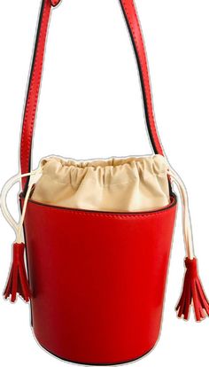 Trendy Leather Bucket Bag, Modern Red Bucket Bag With Adjustable Strap, Modern Red Satchel Bucket Bag, Chic Red Bucket Bag With Large Capacity, Trendy Red Crossbody Bucket Bag, Red Leather Bucket Bag, Modern Red Bucket Bag, Leather Crossbody Bucket Bag With Phone Bag, Red Shoulder Bucket Bag With Dust Bag