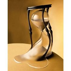 an hourglass sitting on top of a table