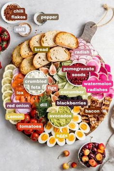 a platter filled with different types of food on top of a white countertop