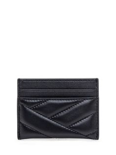 Black leather-colored card holder. Exterior card compartment on front and back. Quilted motif. Gold metal Double T logo patch on front. Width: 10.5 Height: 5 Depth: 0.5Gender: WomenMaterial: OUTSIDE: 100% LEATHER LINING: 100% LEATHER FINISHING: 100% METALColor: BlackMade in: IMPORTEDProduct ID: 90345 001*Import tax/duty will be calculated at checkout (If applicable) Leather Card Holder With Logo Plaque For Everyday, Black Wallets With Logo Plaque For Everyday Use, Classic Black Card Holder With Logo Plaque, Modern Rectangular Card Holder With Logo Plaque, Black Rectangular Card Holder With Logo Plaque, Classic Luxury Black Card Holder, Black Leather Card Holder With Logo Plaque, Classic Black Luxury Card Holder, Luxury Designer Black Card Holder