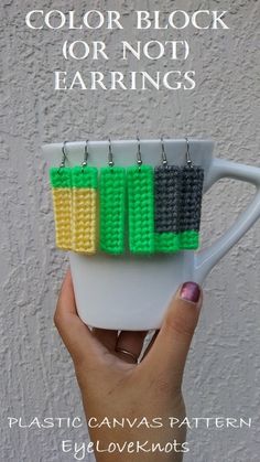 a hand holding a coffee cup with four knitted cups attached to the handles, and text overlay that says color block or nod earrings