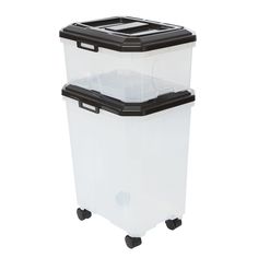 two plastic storage containers with wheels and lids on each side, one is black and the other is white