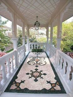 the walkway is decorated with mosaic tiles