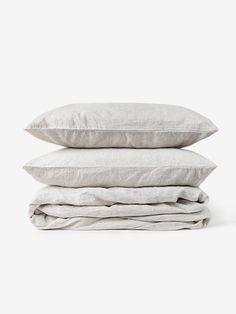 three pillows stacked on top of each other