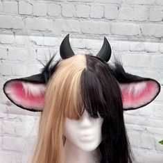 Goth cow ears with black resin horns!  Baby pink & Black faux fur cow ears with pink inner ear shading! - Black Resin Horns are wrapped to the headband! They are not removable. My shop's ears and tails are completely hand crafted and might have some slight differences in trimming and airbrushing. Processing times:  Made to order: 4 weeks READY TO SHIP: 1-3 days ** If you need your ears sooner, please message me and we can work on setting up a RUSH ORDER for your desired date! Thank you! Rush fee is $20 to expedite the PROCCESING TIME not the Shipping time! :) ** PLEASE NOTE: CUSTOMIZATIONS TO ORDERS MUST BE MADE PRIOR TO PURCHASING! WE ARE NOT RESPONSIBLE FOR ANY CUSTOMIZATIONS AFTER PURCHASE IS MADE.  ALL CUSTOM ORDERS ARE FINAL WITH NO RETURNS. Thank you for the support of our small shop Ear Shading, Cow Cosplay, Horns Headband, Halloween Cow, Cow Ears, Horn Headband, Inner Ear, Black Cow, Black Resin