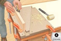 a person is working with woodworking tools on a workbench in the process of being made