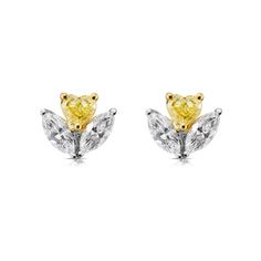 Delicate and fun earrings with a yellow diamond Heart sitting on two Marquise diamonds Fancy Yellow and FG VS quality 18kt Gold Yellow Diamond Earrings With Gemstone, Yellow Diamond Earrings In Fine Jewelry Style, Yellow Diamond Earrings With Diamond Accents, Fine Jewelry Yellow Diamond Earrings, Yellow Diamond Earrings With Diamond Accents For Wedding, Yellow Diamond Earrings With Accents For Wedding, Wedding Yellow Diamond Earrings With Accents, Luxury Yellow Diamond Drop Earrings, Yellow Diamond Accent Earrings For Anniversary