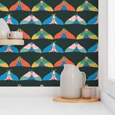 the wallpaper is designed with colorful birds on black