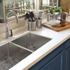 the kitchen sink is clean and ready to be used for cooking or cleaning up with utensils