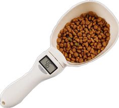 a white measuring spoon filled with dog food